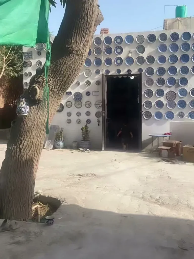 The entrance to our Multan factory, the wall set with our own plates