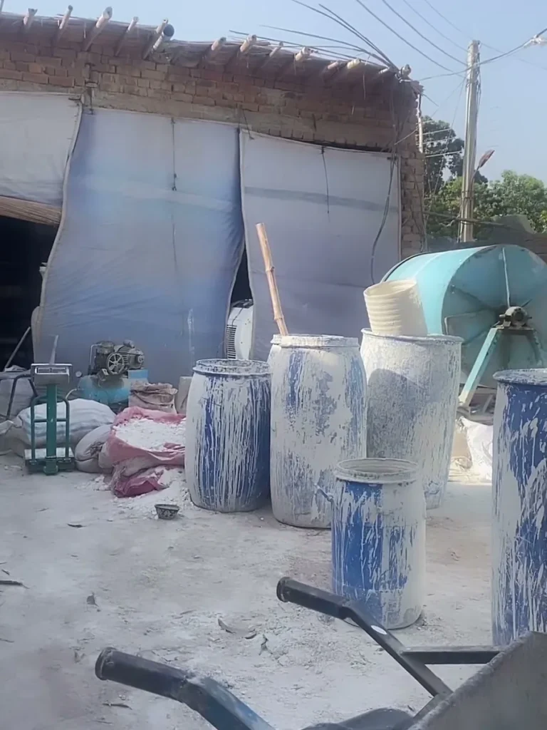 The yard where the clay is prepared, under the factory shed