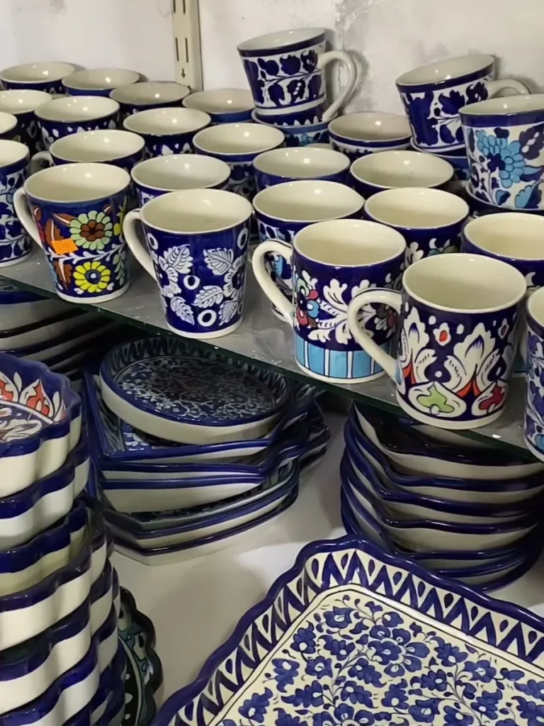 Mugs and stacked plates in the display centre