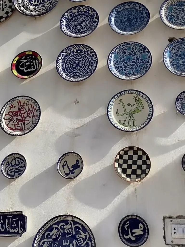 The plate wall at our display centre in Multan