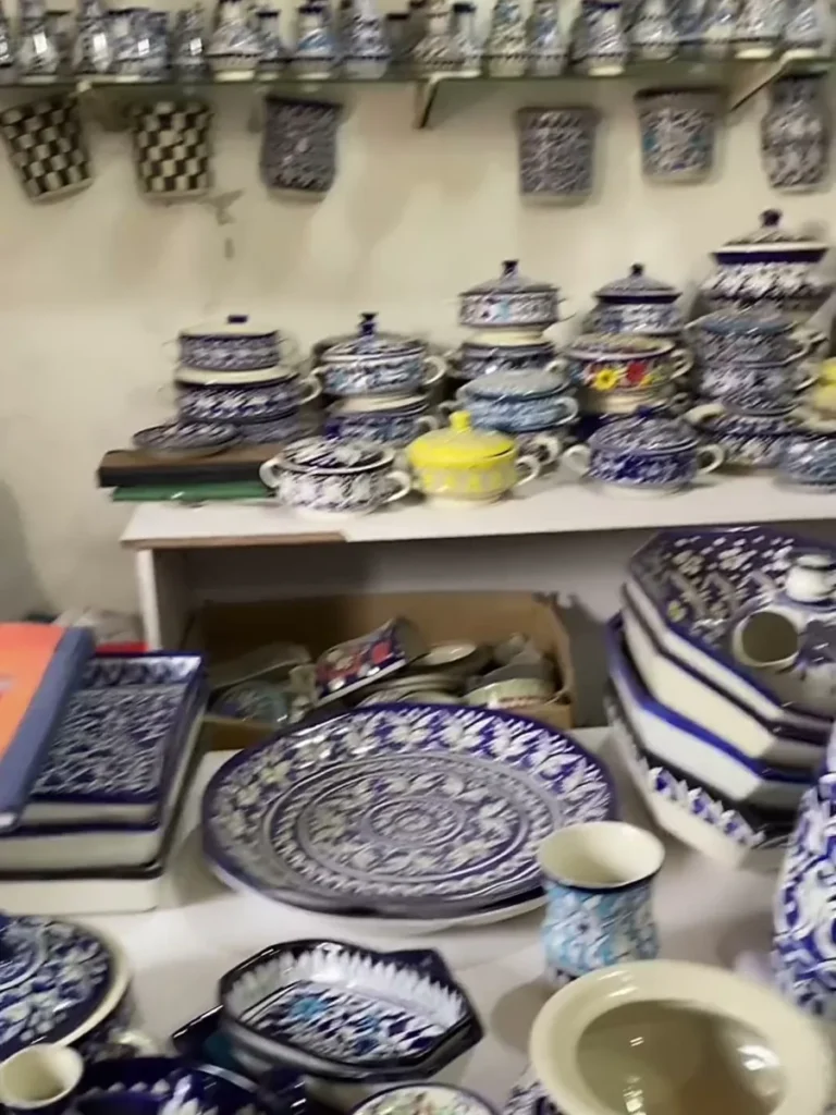 Pots and serving dishes on the showroom shelf