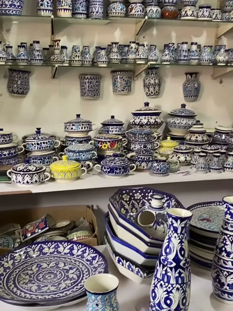Showroom shelves filled with hand painted Multani blue pottery