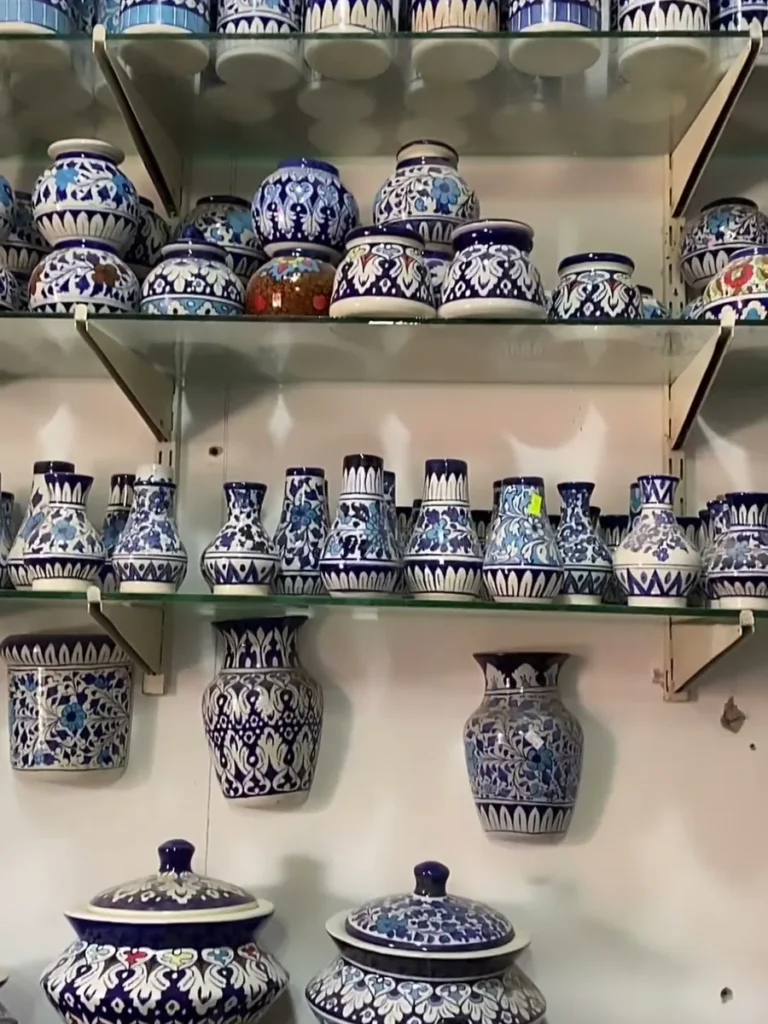 Vases and lidded jars filling the showroom shelves